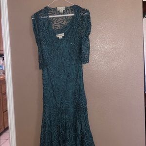 100% silk hand crafted dress.